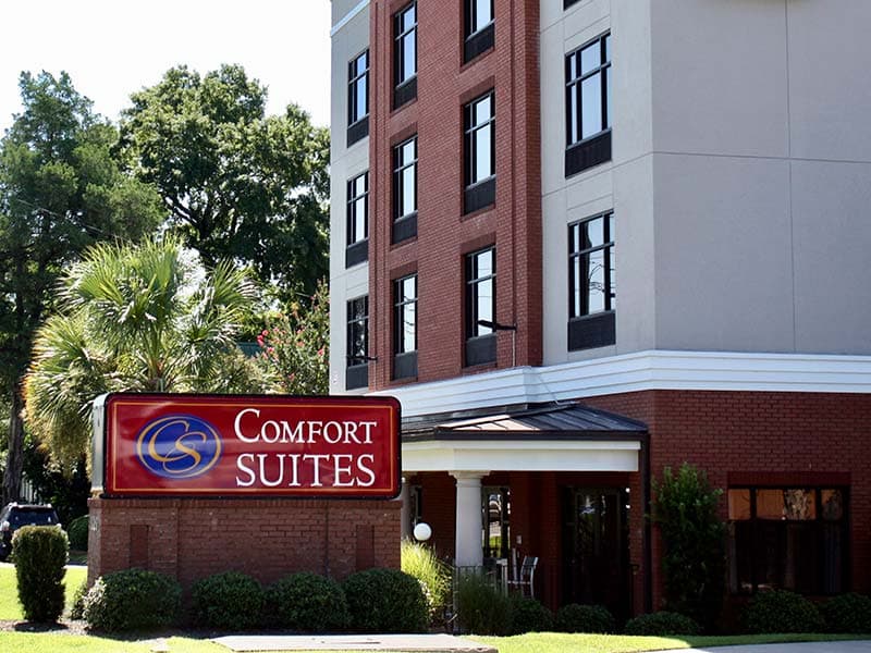 Comfort Suites hotel with maintained lawn and landscaping