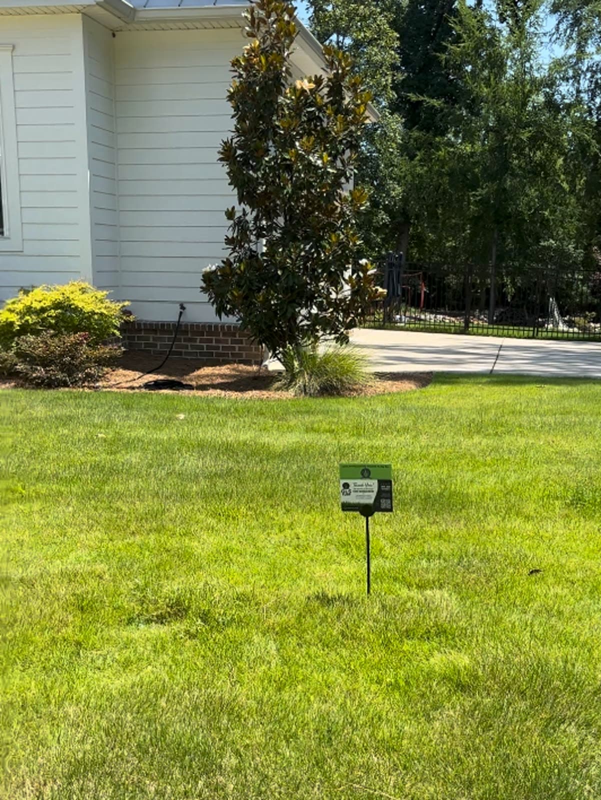 GLS Turf service sign in a treated residential lawn in Lexington, South Carolina